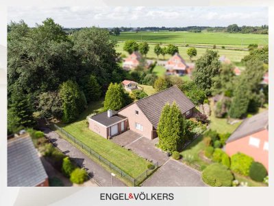 Familienfreundliches Einfamilienhaus mit Garage und viel Platz im Grünen