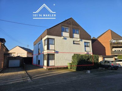 Als Kapitalanlage: Schöne 3-Zimmer-EG-Wohnung mit Terrasse, Garten, Carport und 3 Pkw-Stellplätzen