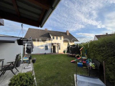 Exklusive Dachwohnung mit Gartenanteil und Blockhaus in Toplage
