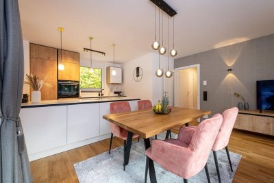 Moderne 3-Zimmer-Dachgeschosswohnung mit südseitiger Dachterrasse und Tiefgaragenplatz