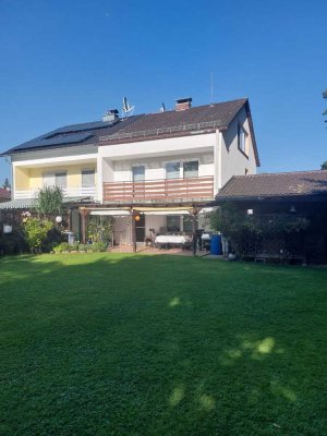 Attraktive Wertanlage für die Zukunft: Vermietete Haushälfte, idyll. ruhige Lage mit großem Garten