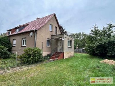 RESERVIERT -Grundstück mit geräumiger DHH in ruhiger Ortsrandlage