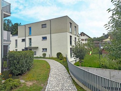 Moderne 4-Zimmer Gartenwohnung mit zwei Tiefgaragenstellplätzen