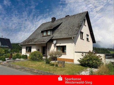 Gepflegtes Einfamilienhaus mit  Nebengebäude und idyllischem großen Gartengrundstück