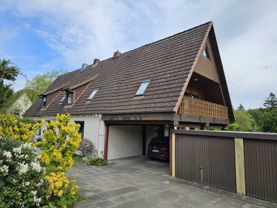 Charmante DG-Wohnung mit Garage & Garten – ideal für Singles oder Paare