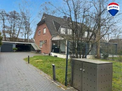 Doppelhaushälfte mit Einbauküche, Vollkeller & Garten in Hamburg-Hausbruch (Neugraben)