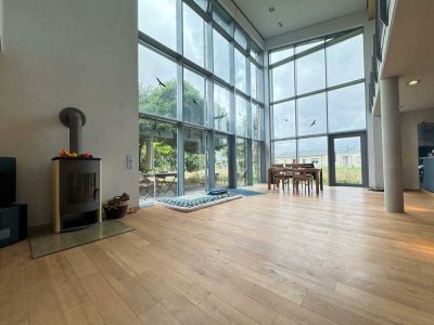 Wunderschönes lichtdurchflutetes Einfamilienhaus mit besonderer Architektur in ruhiger Lage