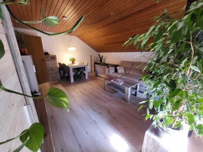 Freundliche 3-Zimmer-Dachgeschosswohnung mit Balkon & Garten in Talheim