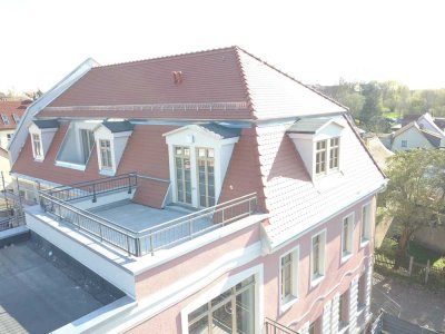 **2-Zi.- DG mit Terasse und Stellplatz**