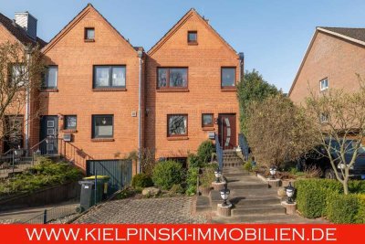 ! Endreihenhaus mit sonnigem Grundstück und Garage !