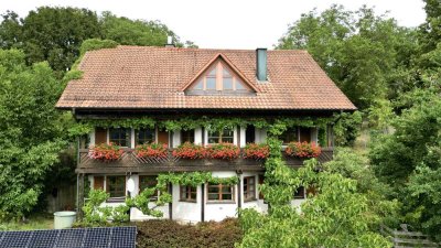 Naturnah! Nachhaltig! Besonders!   Einfamilienhaus mit Einliegerwohnung in Top-Hanglage