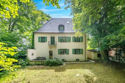 Altbauvilla mit Gewerbeanteil auf parkähnlichem Grundstück