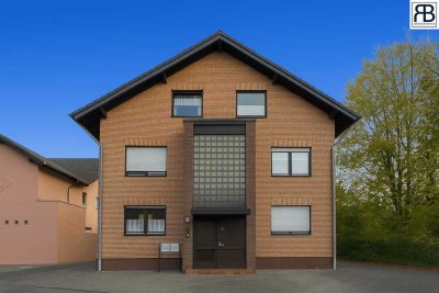 Vermietete Kapitalanlage: Gemütliche 3-Zimmer-Wohnung mit Garten, Terrasse und Garage