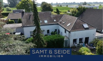 Einmalige Gelegenheit -  Wohnen und Vermieten in Rheinnähe!