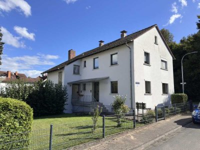 Großzügiges Zweifamilienhaus mit schönem Garten in ruhiger Ortsrandlage!