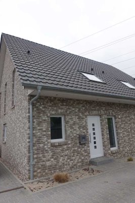 Strandnah gelegene Doppelhaushälfte mit Garten in Scharbeutz