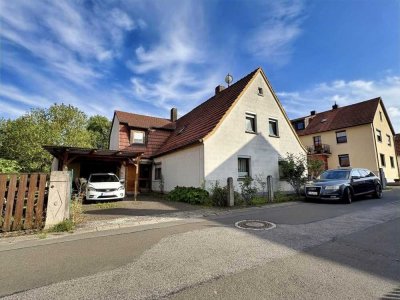 Wohnen & Vermieten: Charmantes Zweifamilienhaus mit Garten