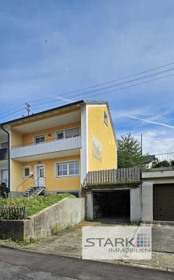 Doppelhaushälfte mit Aussicht, Garten & Garage – ein Eigenheim für Anpacker!