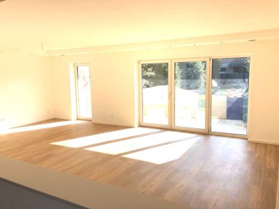 Moderne Wohnung mit großer Terrasse und Garten zur Exklusivnutzung im Herzen von Wevelinghoven