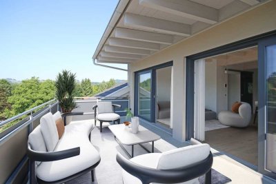 Luxus-Dachgeschosswohnung für junge Menschen mitten im Leben - Bergblick inklusive!