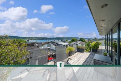 Exklusives, neuwertiges EFH mit Aufzug, Einliegerwhg., Seeblick, traumhaftem Garten u. Baulandres.