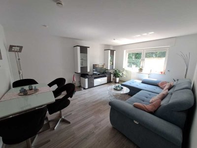Stilvolle 2,5-Raum-Wohnung mit gehobener Innenausstattung mit EBK, Balkon und Garage