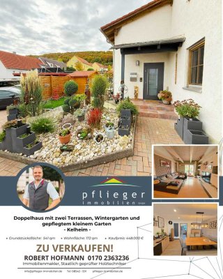 Doppelhaus mit zwei Terrassen, Wintergarten und gepflegtem kleinem Garten