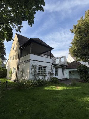 Stillvolle 3-Zimmer-Erdgeschosswohnung mit Garten