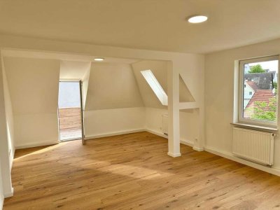 Exklusive 2-Zimmer-Wohnung mit Dachterrasse, Küche und Stellplatz
