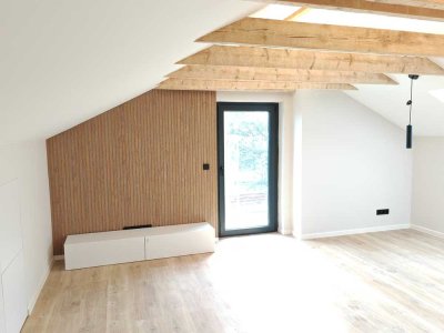 Erstbezug: Exklusive 3,5-Raum-DG-Wohnung mit geh. Innenausstattung in Top-Lage