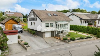 Vielseitiges Einfamilienhaus mit Einliegerwohnung und zzgl. Baugrundstück