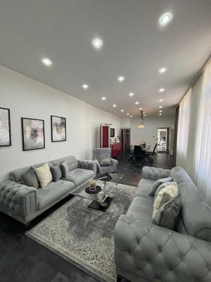 Großzügige und moderne Eigentumswohnung mit 4,5 Zimmer und Carport!