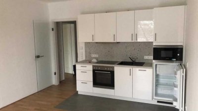 Freundliche, zentrale 2-Zimmer-Wohnung mit Balkon und EBK im Neubau in Bremen