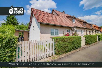 Charmantes Einfamilienhaus mit Gartenidylle und Garage