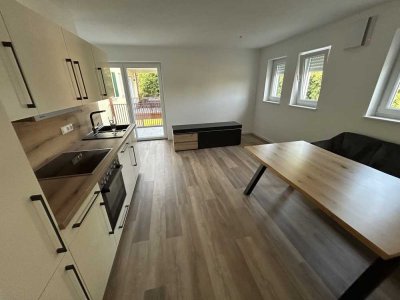 Erstbezug mit Balkon und EBK: Stilvolle 2-Raum-Wohnung mit gehobener Innenausstattung in Karlshuld