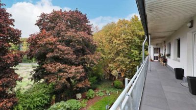 Lichtdurchflutete, sanierte 3-Zimmer-Wohnung mit Süd-Balkon, Garage & Gartenmitnutzung