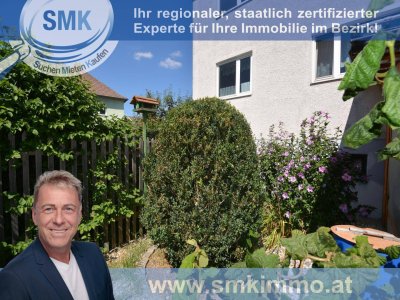 Urbanes Zweifamilienhaus mit exquisitem Garten voller Pfirsiche!