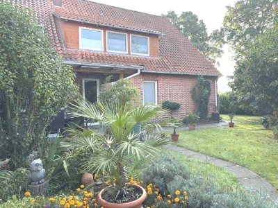EG- Wohnung mit Terrasse und eigenem Garten!