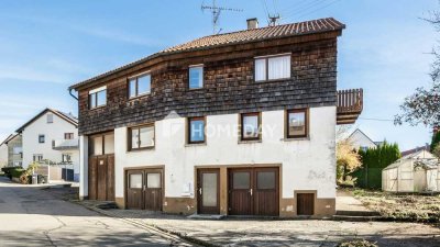 Freistehendes Einfamilienhaus in Hanglage mit Geschichte und Charakter