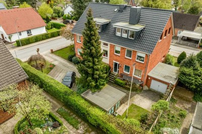 Große EG-Wohnung mit Gartenanteil, zwei Balkonen und Garage - Teilung möglich!