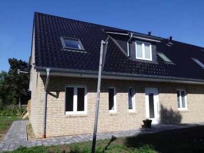 Moderne Eigentumswohnung mit Garten in zentraler Lage von Husum
