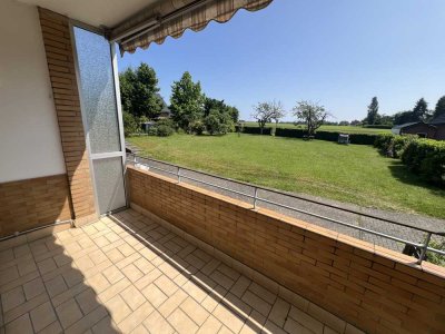 Sanierungsbedürftige 2 Zi-ETW mit Südbalkon und Blick über die Felder & Einzelgarage in Reusrath!