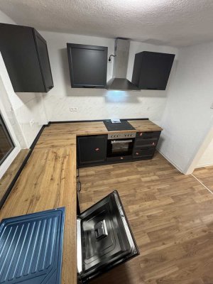 Moderne Erdgeschosswohnung mit Süd-Terrasse & neuer Einbauküche – Erstbezug nach Sanierung