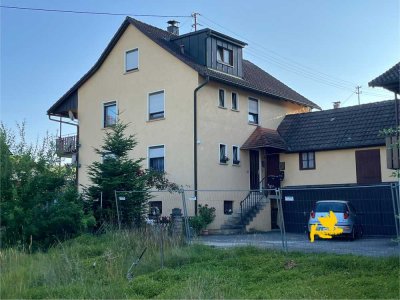 2 1/2-Familienhaus mit schönem Garten und 3 Garagen