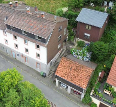 Günstiges Renditeobjekt mit 4 Wohneinheiten, 3FH + Einliegerhaus am Waldrand