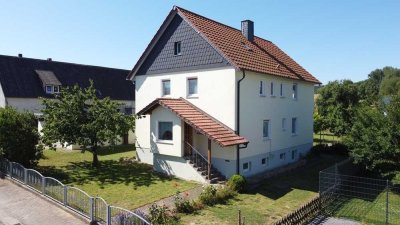 Wunderbar gelegenes Einfamilienhaus mit Bauland!
