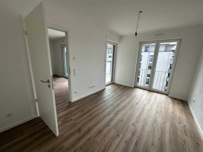 Erstbezug mit Fernblick - Ruhige, helle 2-Zimmer-Wohnung mit großem SW-Balkon und TG