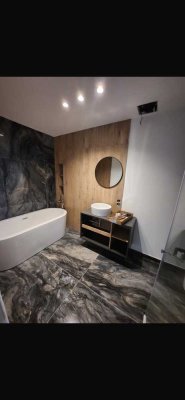 Luxuriöse 2-Zimmer-Wohnung mit Einbauküche und eigenem Garten