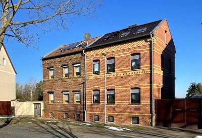 Ideal für Familien: gemütliche Doppelhaushälfte in Raguhn mit großem Garten und idyllischem Teich