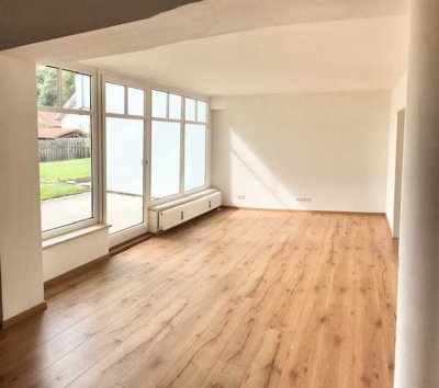Geräumige 4-Zi.-Whg. im EG mit Süd-Terrasse & Gartenmitnutzung.
